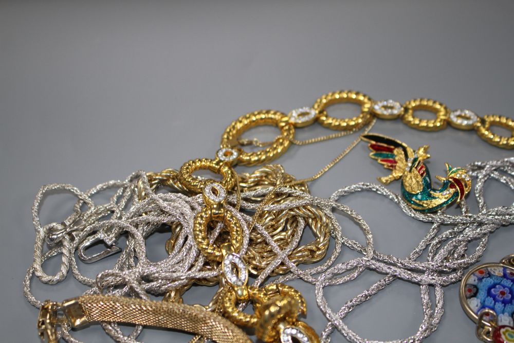 Seven assorted costume necklaces including a millefiore glass necklace, a costume bird brooch and bracelet with coloured paste stone